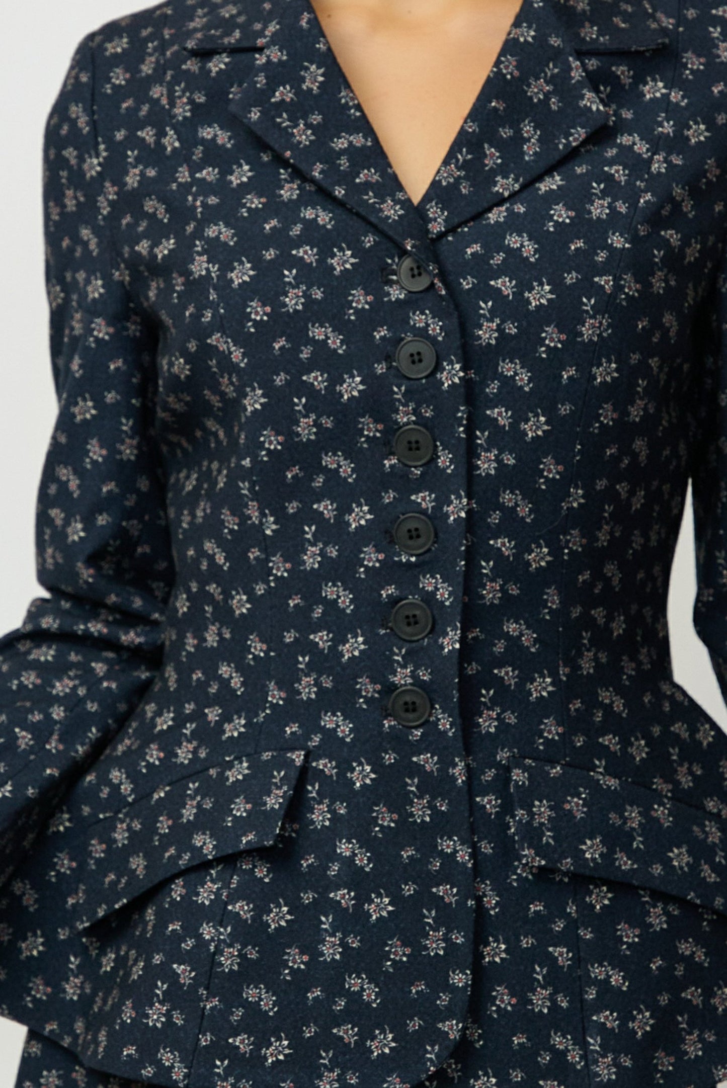 Jacket with peplum and lapel, made of 100% navy wool with small flowers