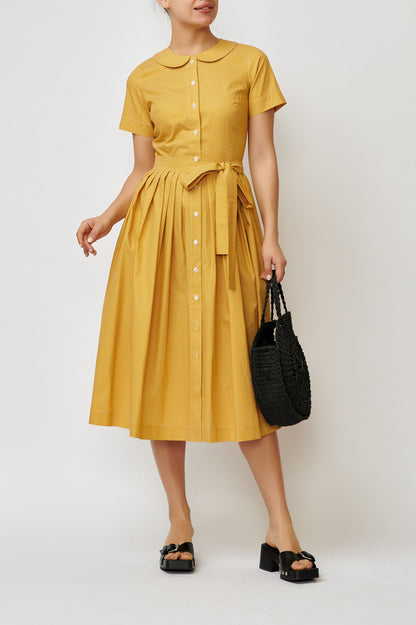 Summer midi shirt dress, made of mustard yellow cotton with polka dots