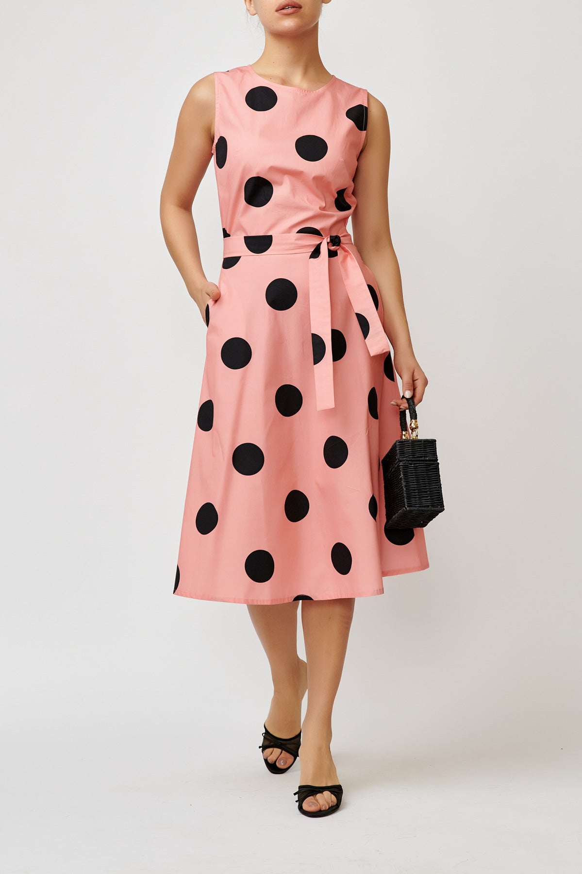 Sleeveless poplin dress with black and pink polka dots