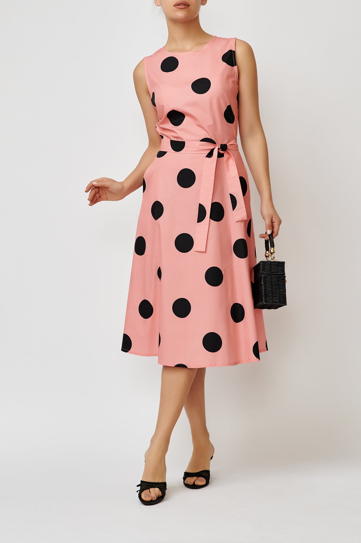 Sleeveless poplin dress with black and pink polka dots