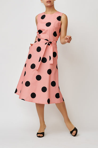 Sleeveless poplin dress with black and pink polka dots