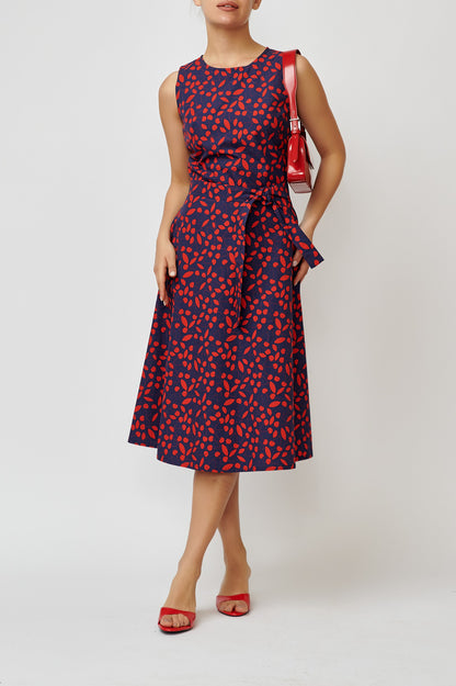 Sleeveless poplin dress with cherries on navy blue