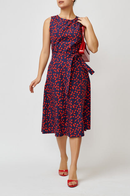 Sleeveless poplin dress with cherries on navy blue