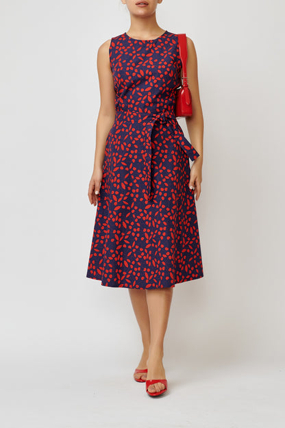 Sleeveless poplin dress with cherries on navy blue