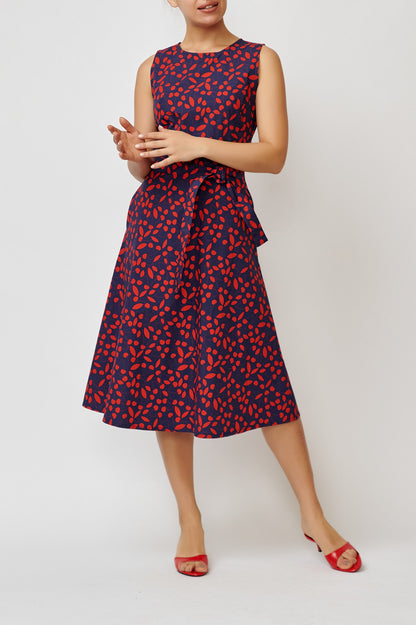 Sleeveless poplin dress with cherries on navy blue