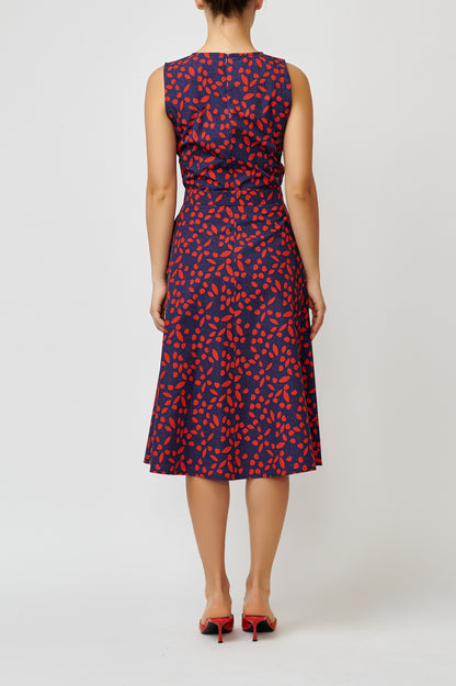 Sleeveless poplin dress with cherries on navy blue