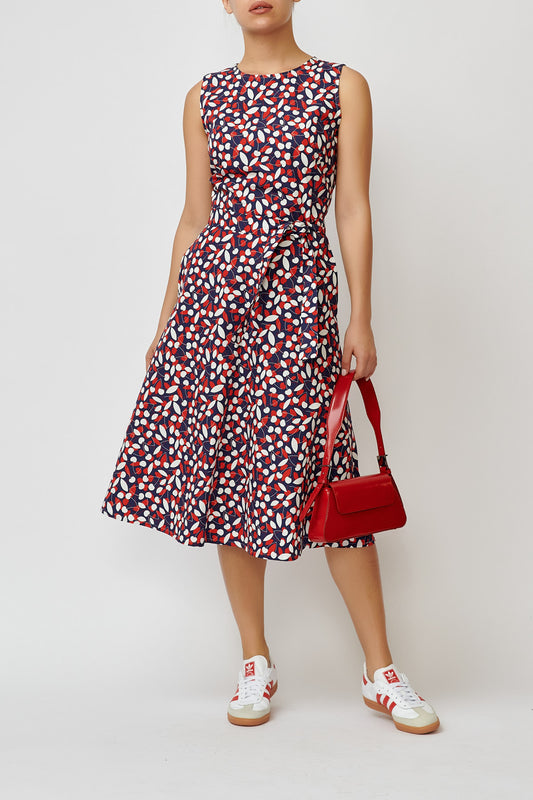 Sleeveless poplin dress with white cherries on navy blue