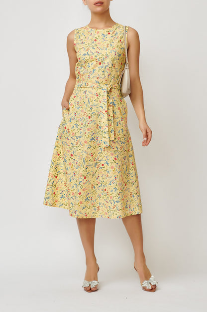 Sleeveless poplin dress with small flowers on a yellow background