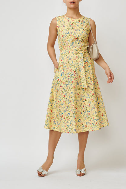 Sleeveless poplin dress with small flowers on a yellow background