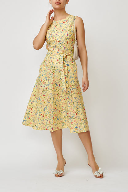 Sleeveless poplin dress with small flowers on a yellow background