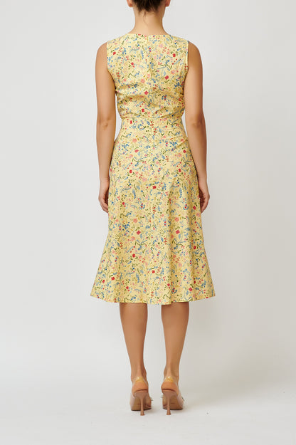 Sleeveless poplin dress with small flowers on a yellow background