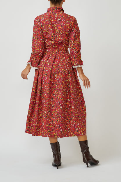 Cotton midi shirt dress with a print of small flowers on the grain